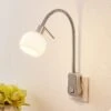 Lindby Aeryn Steckdosenleuchte, Flexarm, Schalter -Beleuchtung Rabatte 8032242