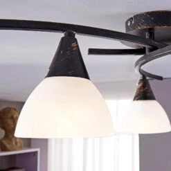 Dreiflammige Deckenlampe Della, Schwarz-gold 15 Dreiflammige Deckenlampe Della, Schwarz-gold -Beleuchtung Rabatte 9620970 5